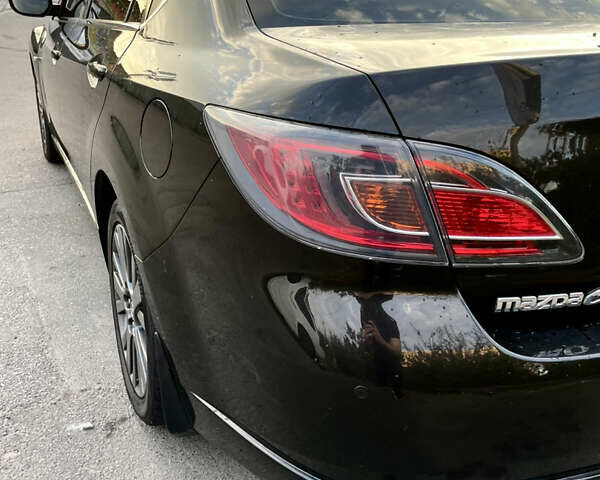 Черный Мазда 6, объемом двигателя 2 л и пробегом 248 тыс. км за 6800 $, фото 6 на Automoto.ua