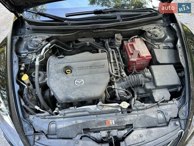 Черный Мазда 6, объемом двигателя 2 л и пробегом 129 тыс. км за 9450 $, фото 10 на Automoto.ua