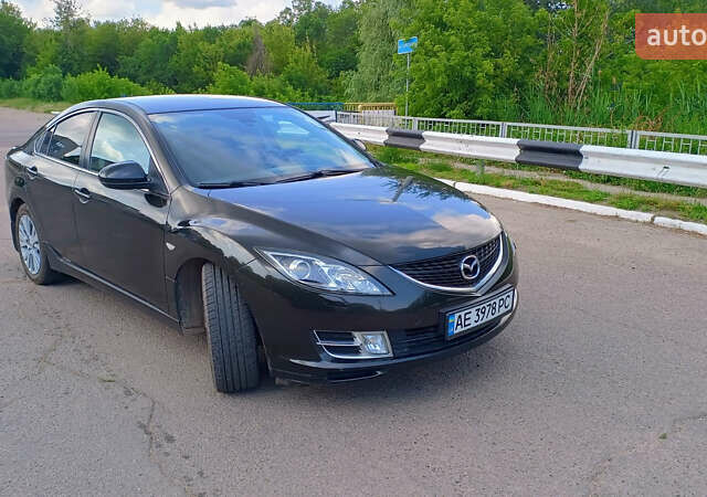 Черный Мазда 6, объемом двигателя 2 л и пробегом 211 тыс. км за 7850 $, фото 1 на Automoto.ua