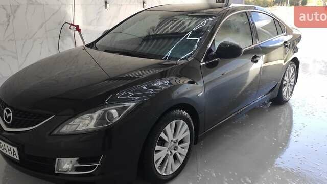 Чорний Мазда 6, об'ємом двигуна 2 л та пробігом 163 тис. км за 6600 $, фото 4 на Automoto.ua