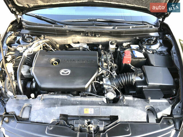 Черный Мазда 6, объемом двигателя 2 л и пробегом 119 тыс. км за 9200 $, фото 49 на Automoto.ua
