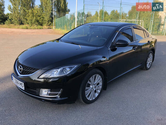 Черный Мазда 6, объемом двигателя 2 л и пробегом 119 тыс. км за 9200 $, фото 1 на Automoto.ua