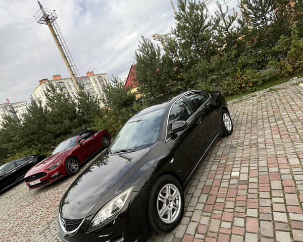 Черный Мазда 6, объемом двигателя 2 л и пробегом 174 тыс. км за 6800 $, фото 8 на Automoto.ua