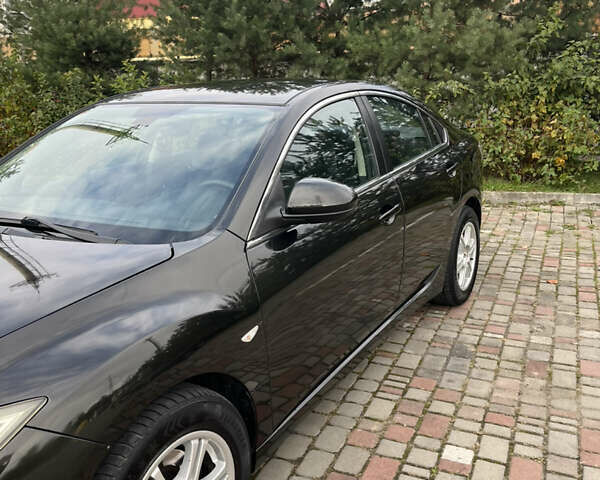 Черный Мазда 6, объемом двигателя 2 л и пробегом 174 тыс. км за 6800 $, фото 11 на Automoto.ua