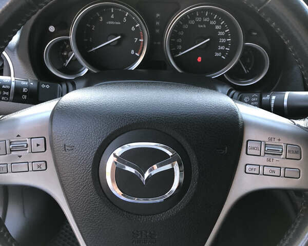 Черный Мазда 6, объемом двигателя 2 л и пробегом 119 тыс. км за 9200 $, фото 24 на Automoto.ua