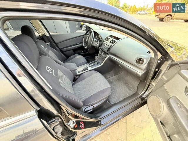 Черный Мазда 6, объемом двигателя 2 л и пробегом 169 тыс. км за 7850 $, фото 9 на Automoto.ua