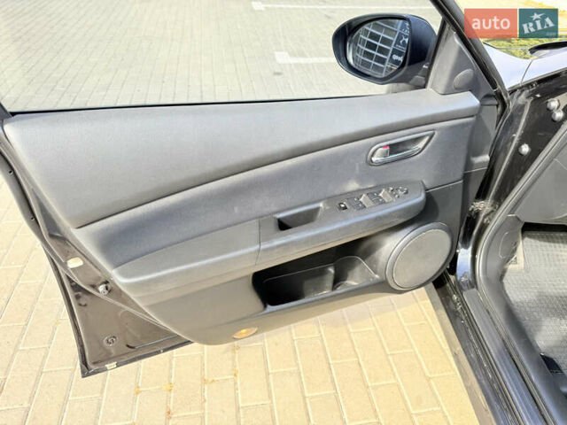 Черный Мазда 6, объемом двигателя 2 л и пробегом 169 тыс. км за 7850 $, фото 24 на Automoto.ua