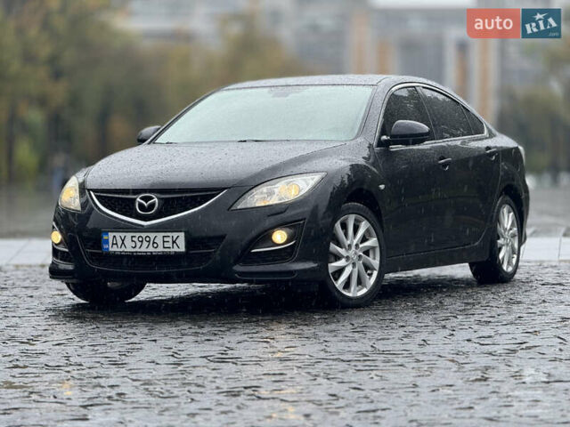 Черный Мазда 6, объемом двигателя 2 л и пробегом 169 тыс. км за 7990 $, фото 4 на Automoto.ua