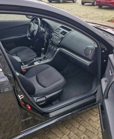 Черный Мазда 6, объемом двигателя 2 л и пробегом 215 тыс. км за 1900 $, фото 7 на Automoto.ua