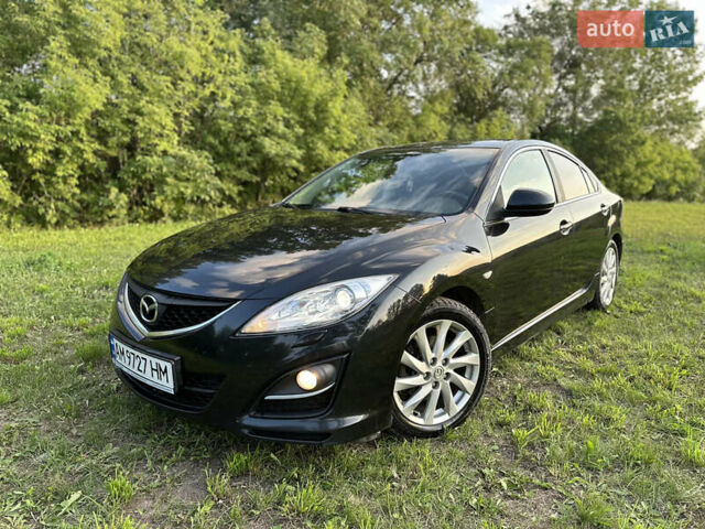 Черный Мазда 6, объемом двигателя 2 л и пробегом 247 тыс. км за 6950 $, фото 1 на Automoto.ua