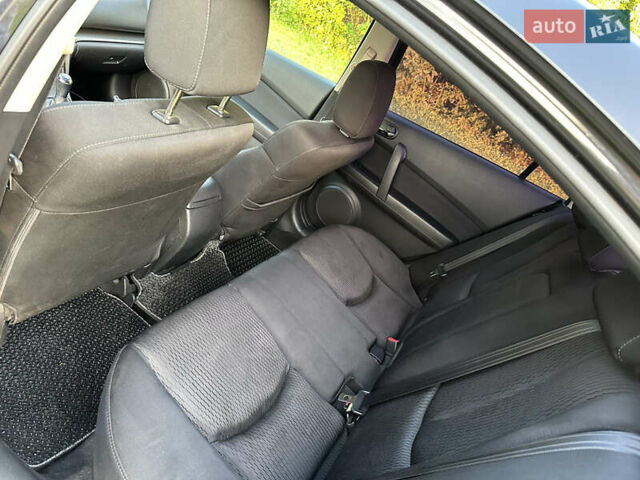 Черный Мазда 6, объемом двигателя 2 л и пробегом 247 тыс. км за 6950 $, фото 22 на Automoto.ua