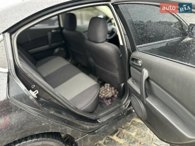 Черный Мазда 6, объемом двигателя 2 л и пробегом 169 тыс. км за 8200 $, фото 40 на Automoto.ua