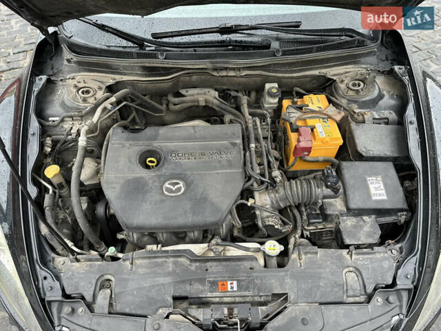 Черный Мазда 6, объемом двигателя 2 л и пробегом 169 тыс. км за 8200 $, фото 44 на Automoto.ua