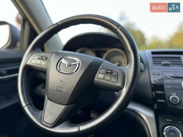 Черный Мазда 6, объемом двигателя 2 л и пробегом 247 тыс. км за 6950 $, фото 19 на Automoto.ua