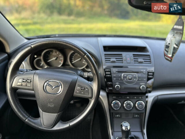 Черный Мазда 6, объемом двигателя 2 л и пробегом 247 тыс. км за 6950 $, фото 18 на Automoto.ua