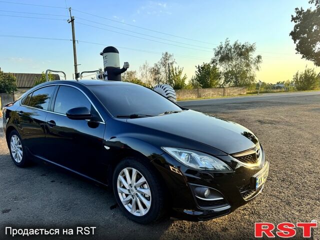 Черный Мазда 6, объемом двигателя 2 л и пробегом 191 тыс. км за 7700 $, фото 1 на Automoto.ua