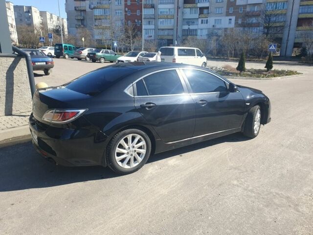Черный Мазда 6, объемом двигателя 2 л и пробегом 195 тыс. км за 9300 $, фото 1 на Automoto.ua