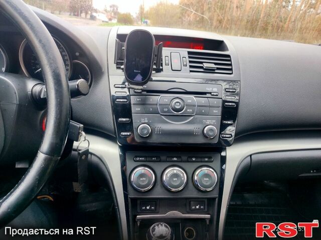 Черный Мазда 6, объемом двигателя 1.8 л и пробегом 223 тыс. км за 7700 $, фото 7 на Automoto.ua