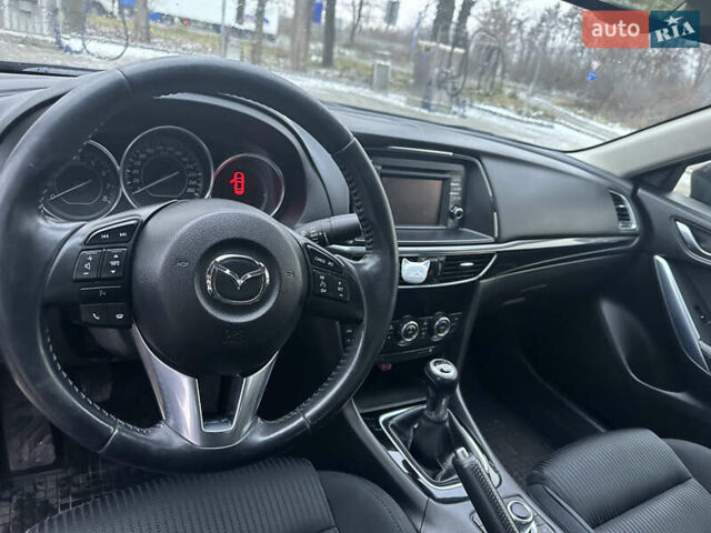 Черный Мазда 6, объемом двигателя 2 л и пробегом 130 тыс. км за 10100 $, фото 16 на Automoto.ua