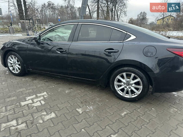 Черный Мазда 6, объемом двигателя 2 л и пробегом 130 тыс. км за 10100 $, фото 10 на Automoto.ua