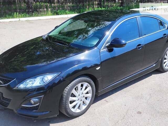 Чорний Мазда 6, об'ємом двигуна 1.8 л та пробігом 223 тис. км за 8299 $, фото 1 на Automoto.ua