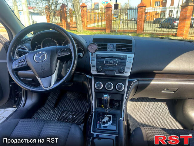 Черный Мазда 6, объемом двигателя 2.5 л и пробегом 210 тыс. км за 7900 $, фото 4 на Automoto.ua