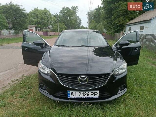 Черный Мазда 6, объемом двигателя 2.5 л и пробегом 170 тыс. км за 11200 $, фото 1 на Automoto.ua