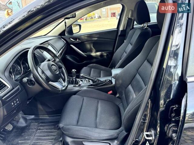 Черный Мазда 6, объемом двигателя 2.19 л и пробегом 213 тыс. км за 10750 $, фото 28 на Automoto.ua