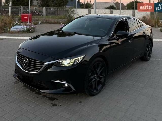 Чорний Мазда 6, об'ємом двигуна 2.49 л та пробігом 185 тис. км за 10500 $, фото 1 на Automoto.ua