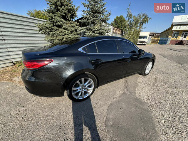 Черный Мазда 6, объемом двигателя 2.49 л и пробегом 167 тыс. км за 10500 $, фото 2 на Automoto.ua