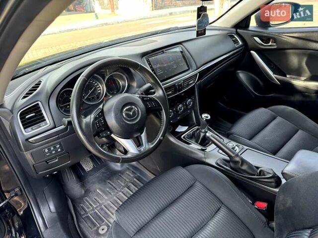 Черный Мазда 6, объемом двигателя 2.19 л и пробегом 213 тыс. км за 10750 $, фото 26 на Automoto.ua