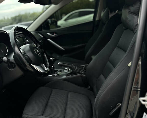 Черный Мазда 6, объемом двигателя 2.18 л и пробегом 280 тыс. км за 10500 $, фото 12 на Automoto.ua