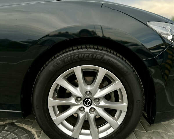 Черный Мазда 6, объемом двигателя 2.18 л и пробегом 280 тыс. км за 10500 $, фото 9 на Automoto.ua