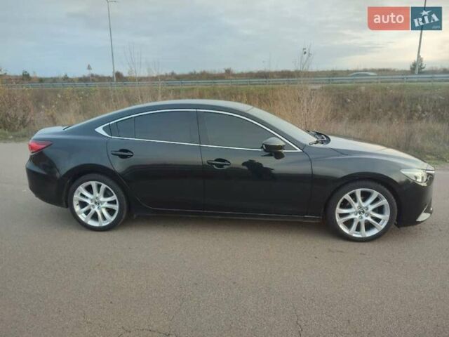 Черный Мазда 6, объемом двигателя 2.49 л и пробегом 186 тыс. км за 9900 $, фото 2 на Automoto.ua