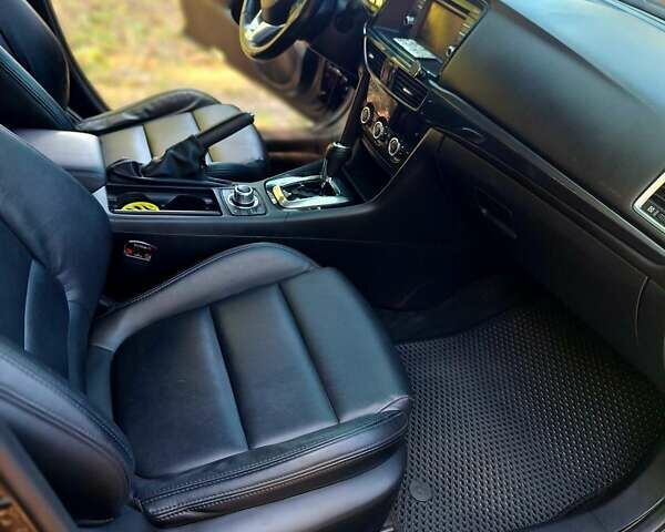Черный Мазда 6, объемом двигателя 2.49 л и пробегом 175 тыс. км за 12200 $, фото 6 на Automoto.ua