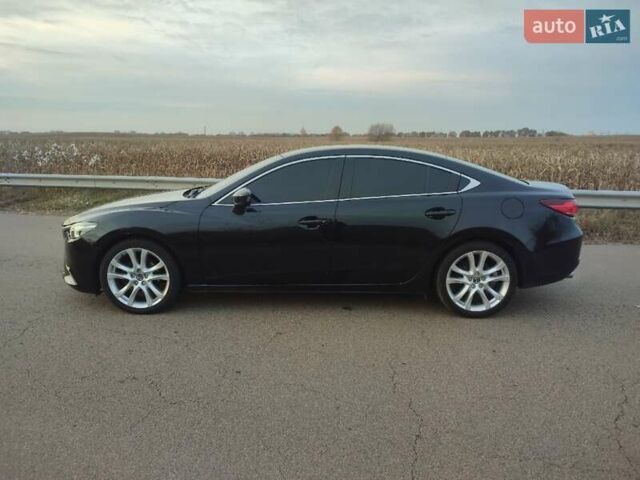 Черный Мазда 6, объемом двигателя 2.49 л и пробегом 186 тыс. км за 9900 $, фото 6 на Automoto.ua
