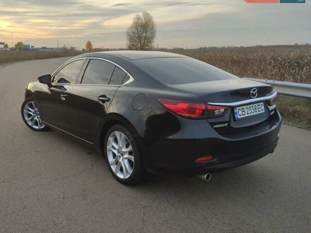 Черный Мазда 6, объемом двигателя 2.49 л и пробегом 186 тыс. км за 9900 $, фото 1 на Automoto.ua