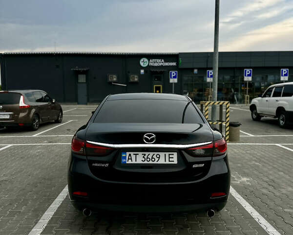 Черный Мазда 6, объемом двигателя 2.18 л и пробегом 280 тыс. км за 10500 $, фото 6 на Automoto.ua