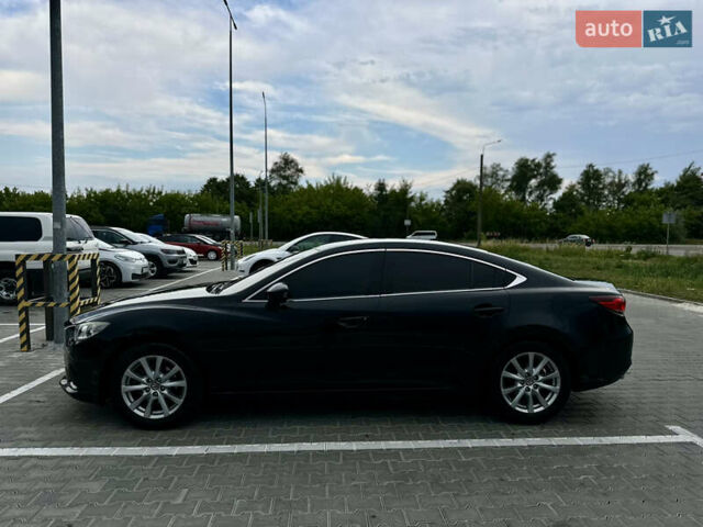 Черный Мазда 6, объемом двигателя 2.18 л и пробегом 280 тыс. км за 10500 $, фото 4 на Automoto.ua