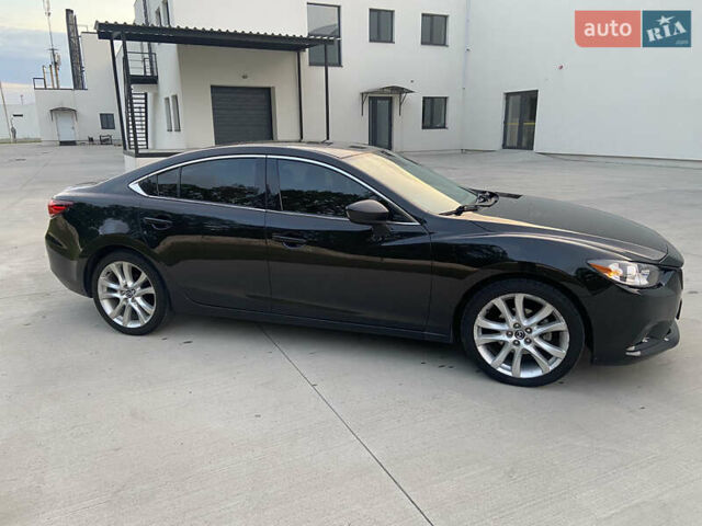 Черный Мазда 6, объемом двигателя 2.49 л и пробегом 310 тыс. км за 10200 $, фото 1 на Automoto.ua