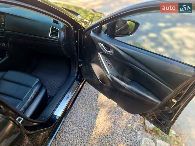 Черный Мазда 6, объемом двигателя 2.49 л и пробегом 175 тыс. км за 12200 $, фото 7 на Automoto.ua
