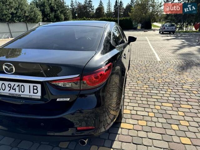Черный Мазда 6, объемом двигателя 2.19 л и пробегом 213 тыс. км за 10750 $, фото 8 на Automoto.ua