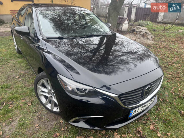 Черный Мазда 6, объемом двигателя 2.49 л и пробегом 178 тыс. км за 11900 $, фото 1 на Automoto.ua