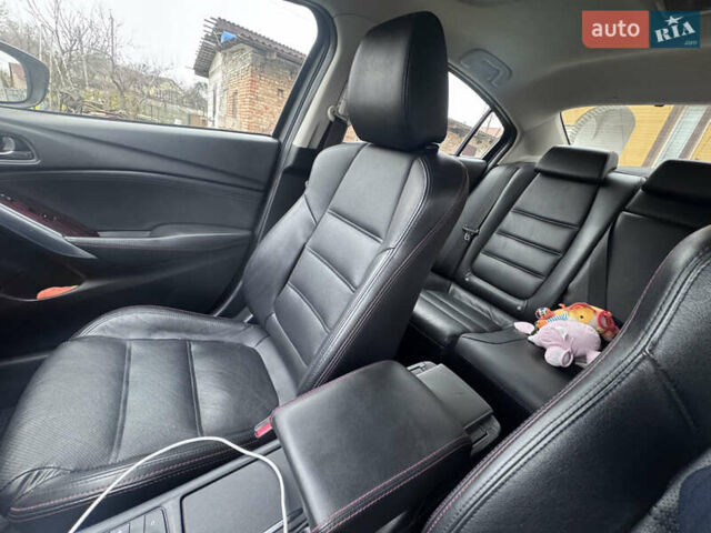 Черный Мазда 6, объемом двигателя 2.49 л и пробегом 178 тыс. км за 11900 $, фото 6 на Automoto.ua