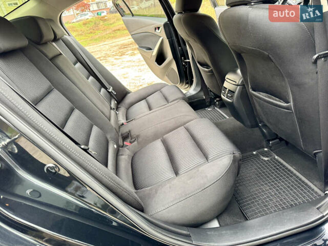Черный Мазда 6, объемом двигателя 2 л и пробегом 152 тыс. км за 12490 $, фото 21 на Automoto.ua