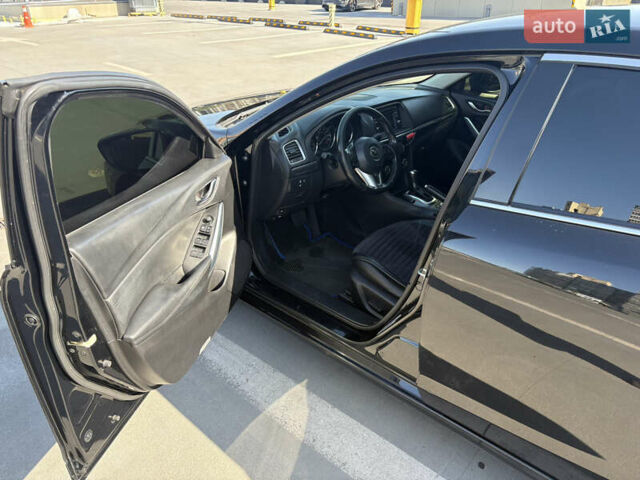 Черный Мазда 6, объемом двигателя 2.49 л и пробегом 215 тыс. км за 12500 $, фото 5 на Automoto.ua