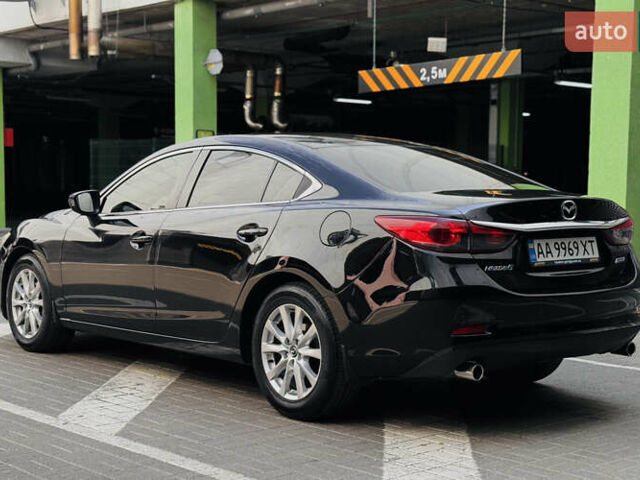 Черный Мазда 6, объемом двигателя 2 л и пробегом 148 тыс. км за 9800 $, фото 1 на Automoto.ua