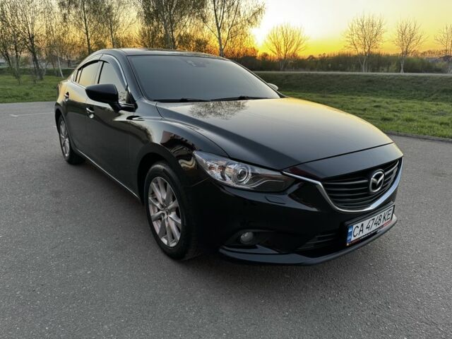 Черный Мазда 6, объемом двигателя 2.5 л и пробегом 320 тыс. км за 10399 $, фото 1 на Automoto.ua