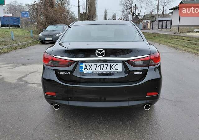 Черный Мазда 6, объемом двигателя 2.49 л и пробегом 94 тыс. км за 12850 $, фото 16 на Automoto.ua