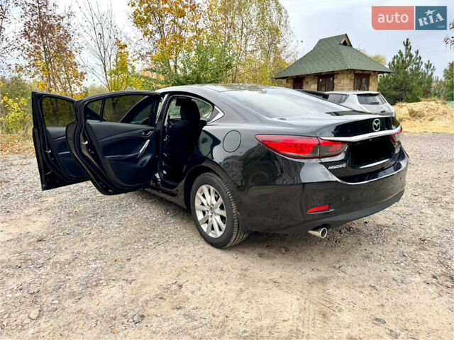 Черный Мазда 6, объемом двигателя 2 л и пробегом 152 тыс. км за 12490 $, фото 41 на Automoto.ua